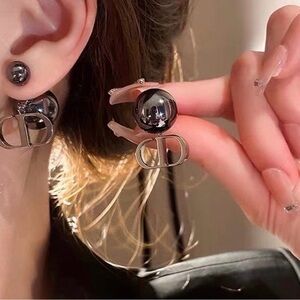 Black Tribales Asymmetrical Pearl Designer Logo Earrings